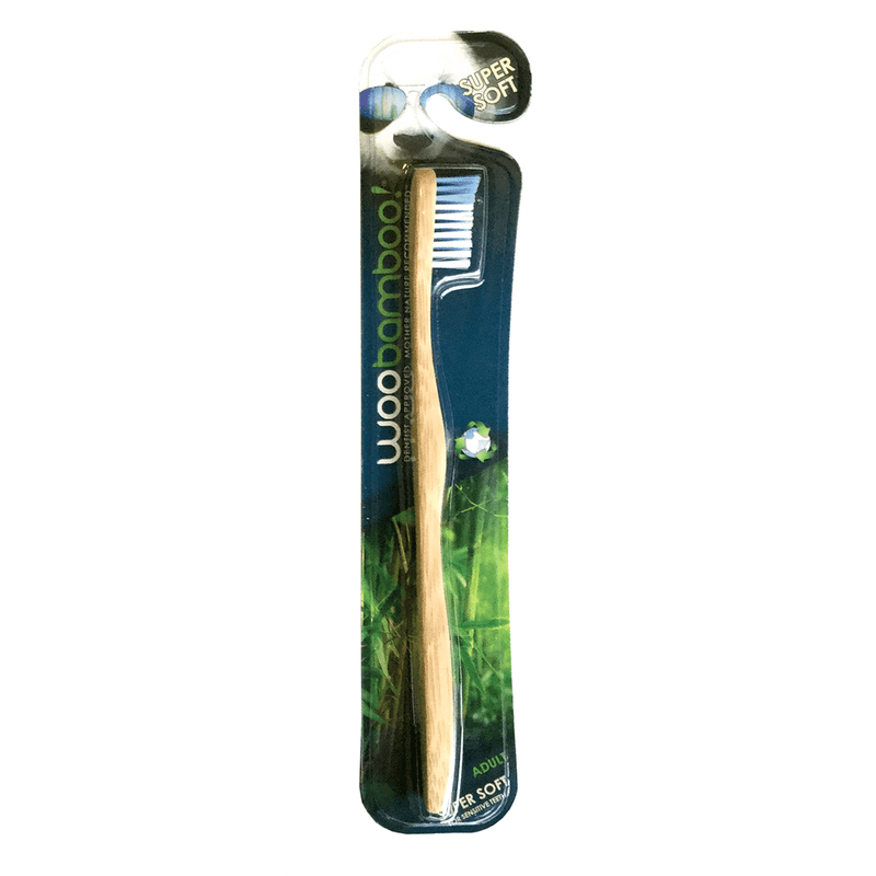 Woobamboo adult supersoft toothbrush with green bamboo handle and white bristles, eco-friendly dental care tool.
