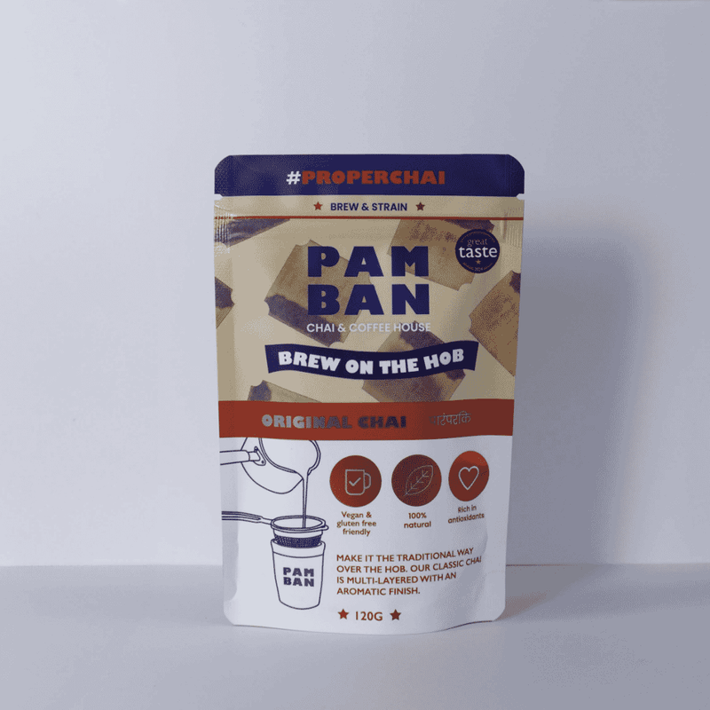 Pamban Chai & Coffee House Original Chai brew and strain setup in a 120g package with chai herbs and spices visible