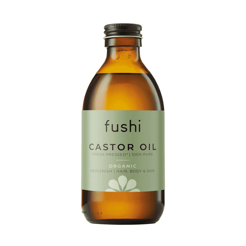 Fushi Castor Oil 250ml bottle with a clear label, golden oil inside, and a simple white cap.