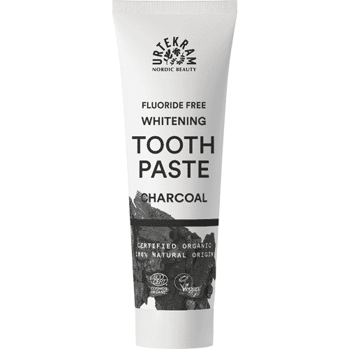 Urtekram fluoride-free whitening toothpaste with charcoal, 75ml, featuring a tube with a black and white label and a twist cap