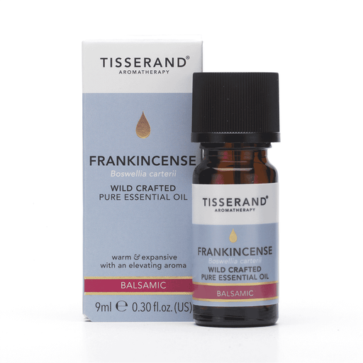 Tisserand Frankincense Wild Crafted Pure Essential Oil 9ml bottle with amber glass and white cap, label showing product details.