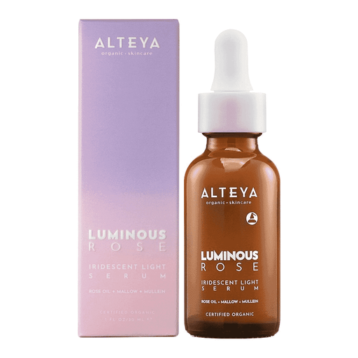 Alteya Luminous Rose Iridescent Light Serum 30ml bottle with iridescent label and dropper applicator, glowing with a luminous finish.