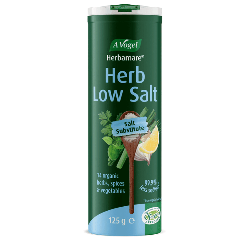 A Vogel Herbamare Herb Low Salt seasoning salt in a 125g container, featuring a green and yellow label with herbs and sea salt.