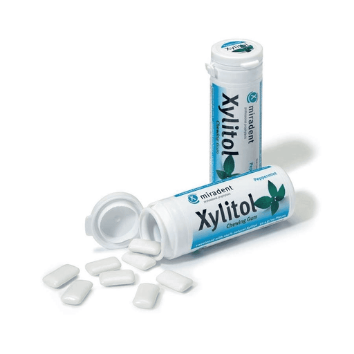 Good Health Naturally Miradent Xylitol Peppermint Gum, 30-piece pack, showing individually wrapped gum pieces with peppermint flavor.