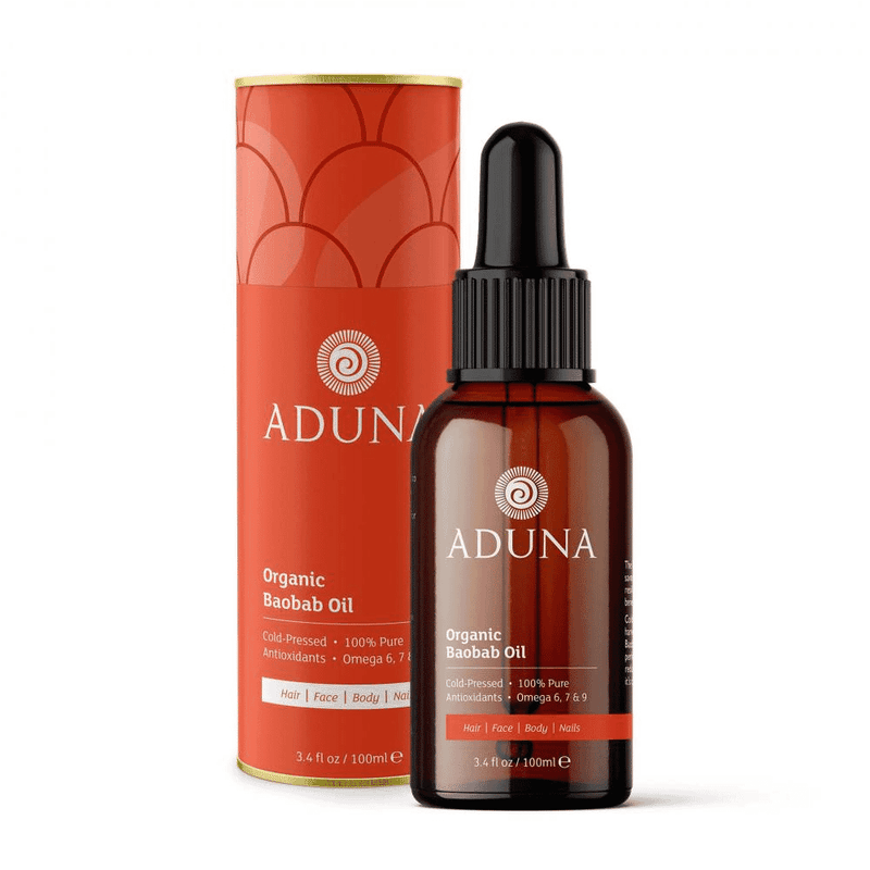Organic Baobab Oil by Aduna in a clear 100ml glass bottle with a white label and black cap, set against a neutral background.