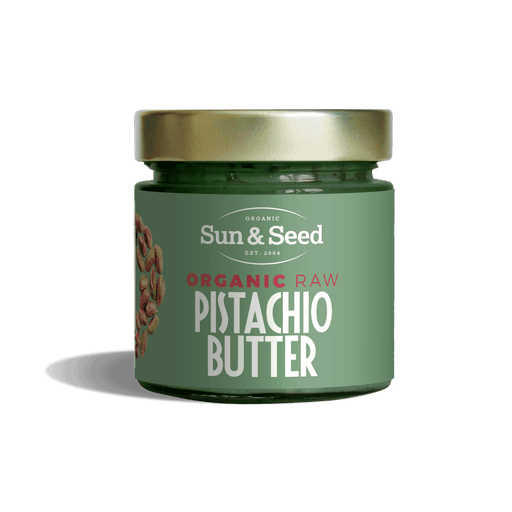 Organic raw pistachio butter from Sun & Seed, 200g jar, showing creamy pistachio spread with natural pistachio nuts in the background.
