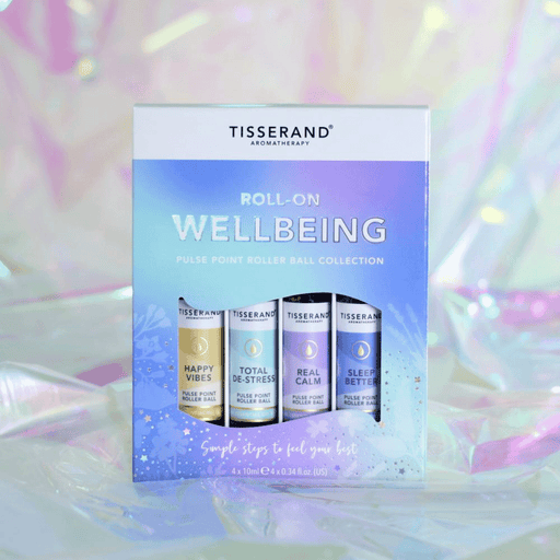 Tisserand Wellbeing Pulse Point Roller Ball Collection with four 10ml roll-on bottles for aromatherapy and relaxation.