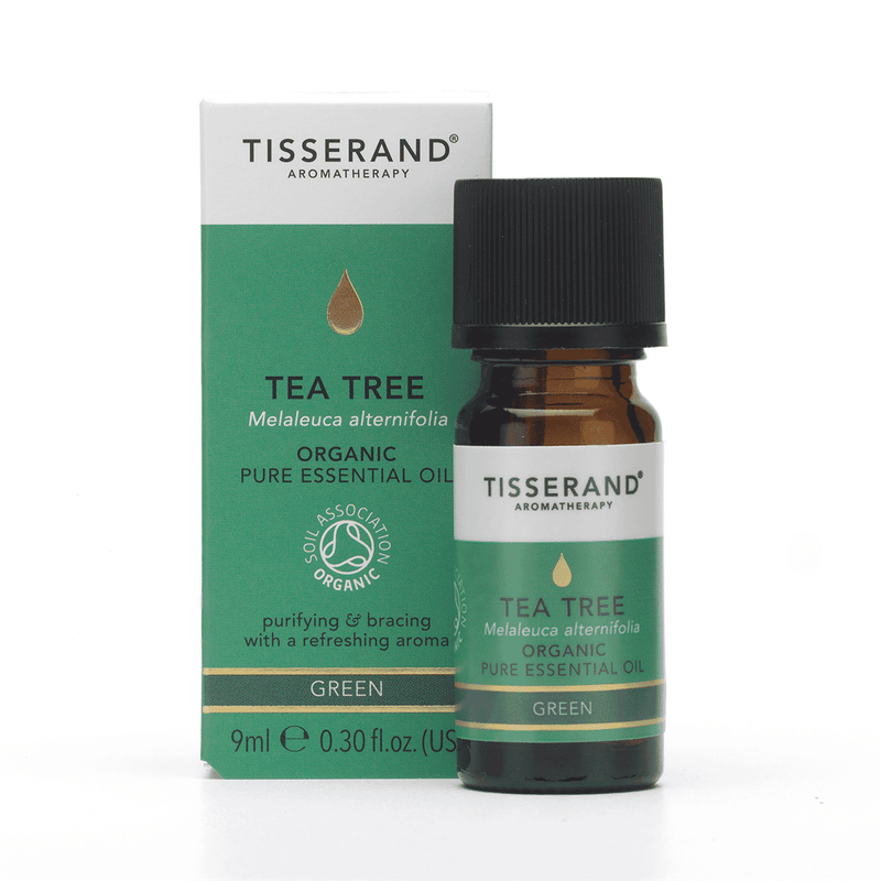 Tisserand Organic Tea Tree Essential Oil in a 9ml bottle, showcasing a amber glass container with a white cap and product label.
