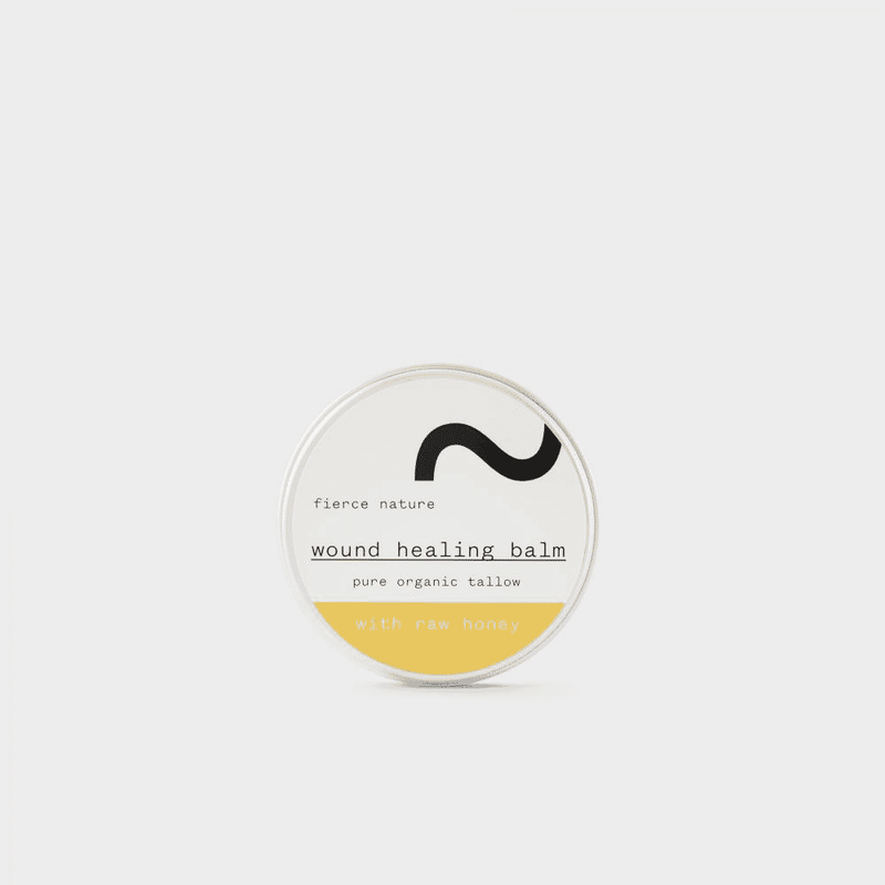 Fierce Nature Wound Healing Balm 50g jar with balm inside, designed for skin repair and soothing wounds.