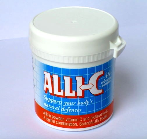 Allicin Alli-C vitamin C supplement bottle with 30 capsules, featuring white and orange packaging and supplement label.